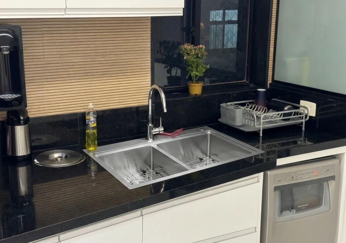 The same kitchen with a LUVUL double bowl workstation sink installed
